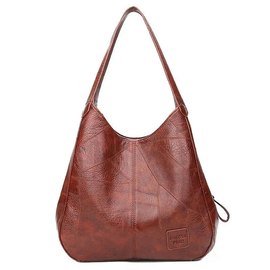 Bolsa Feminina de Couro Modelo Hobo Sienna – Patchwork Conforto e Estilo