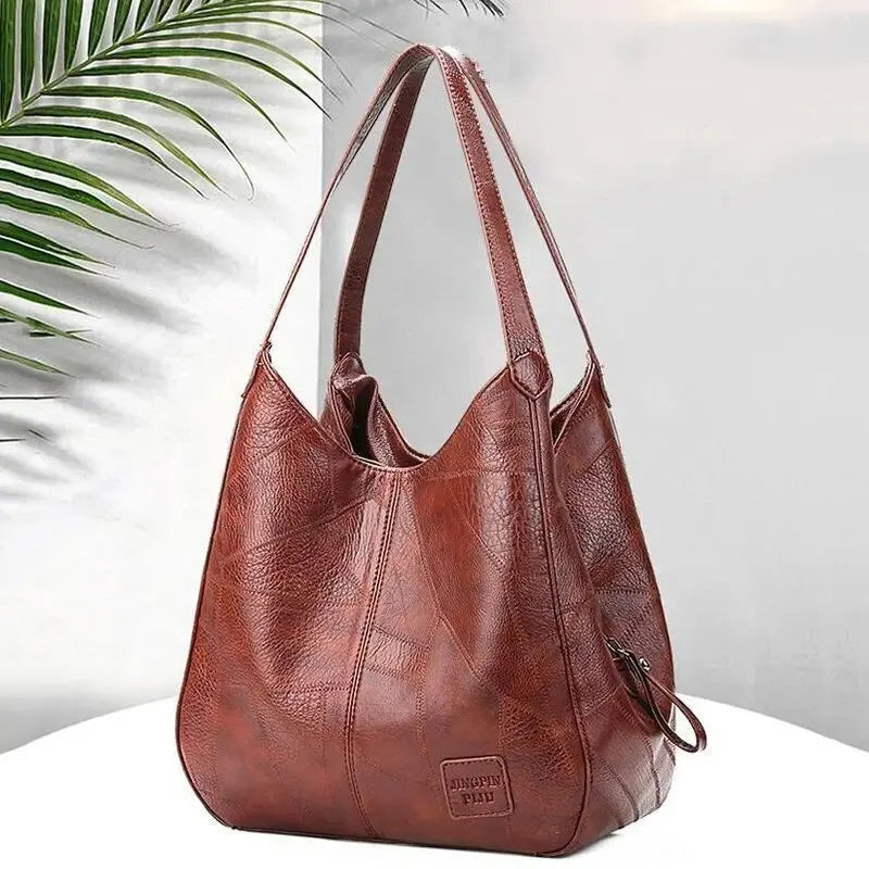 Bolsa Feminina de Couro Modelo Hobo Sienna – Patchwork Conforto e Estilo